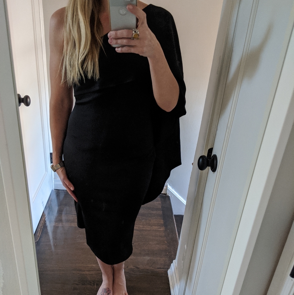 All black one shoulder dress with attached cape